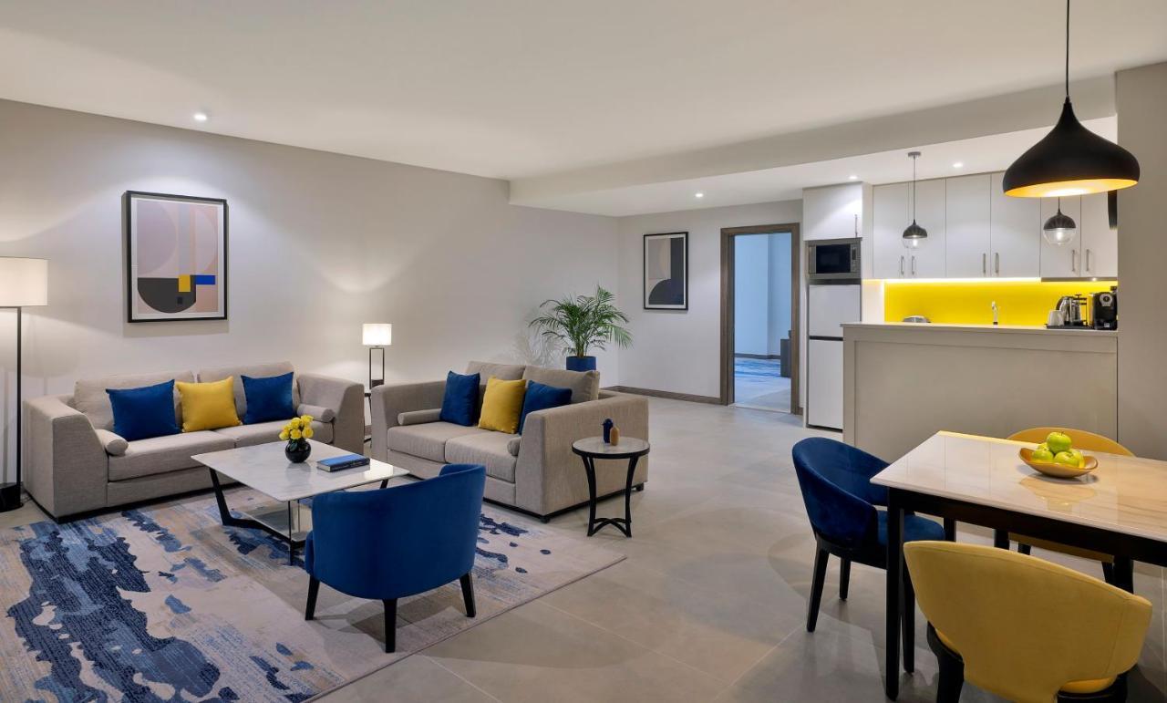 Voco Al Khobar By Ihg Hotel Exterior photo A living room at the hotel