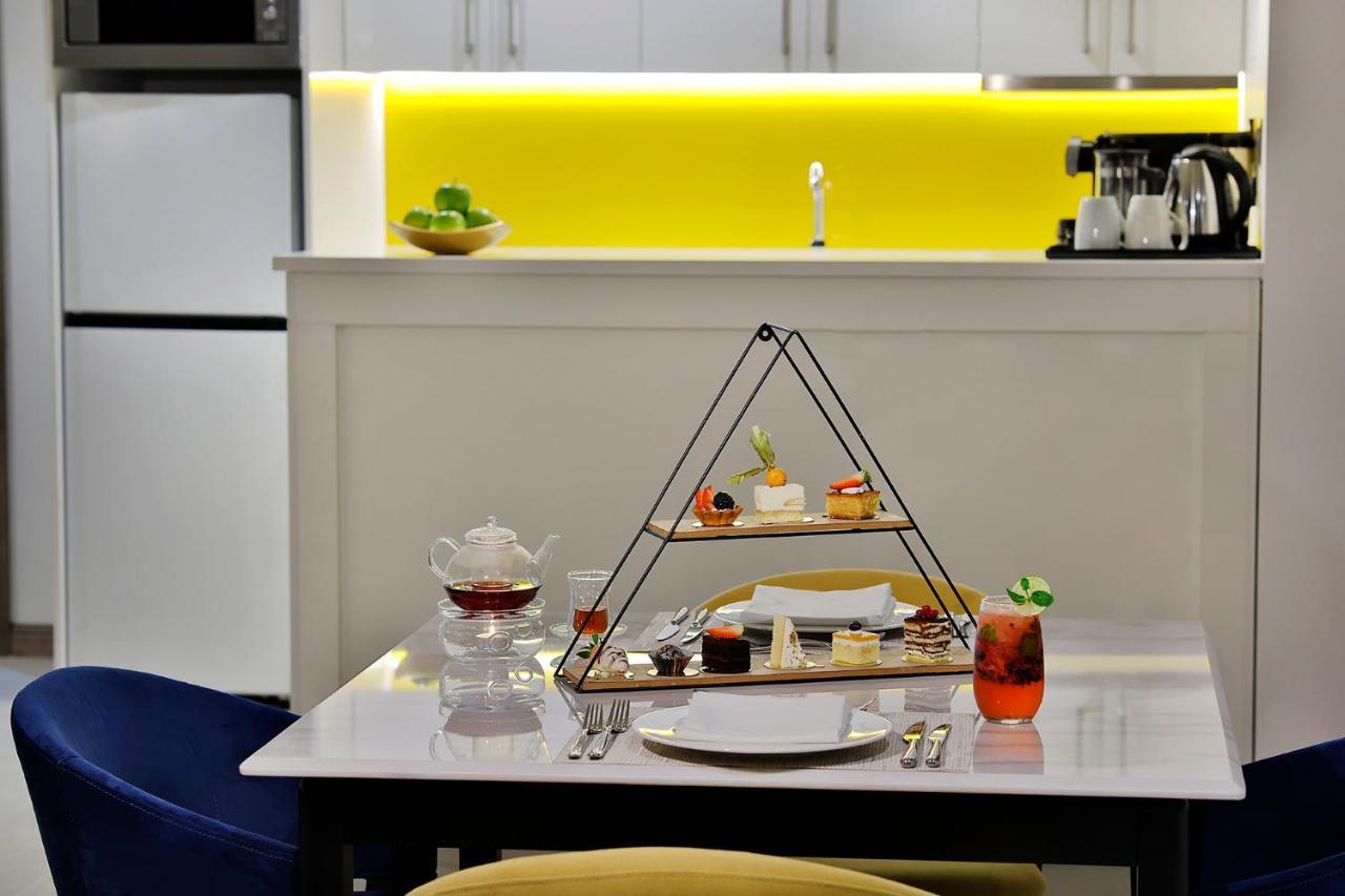 Voco Al Khobar By Ihg Hotel Exterior photo A pyramid cake stand